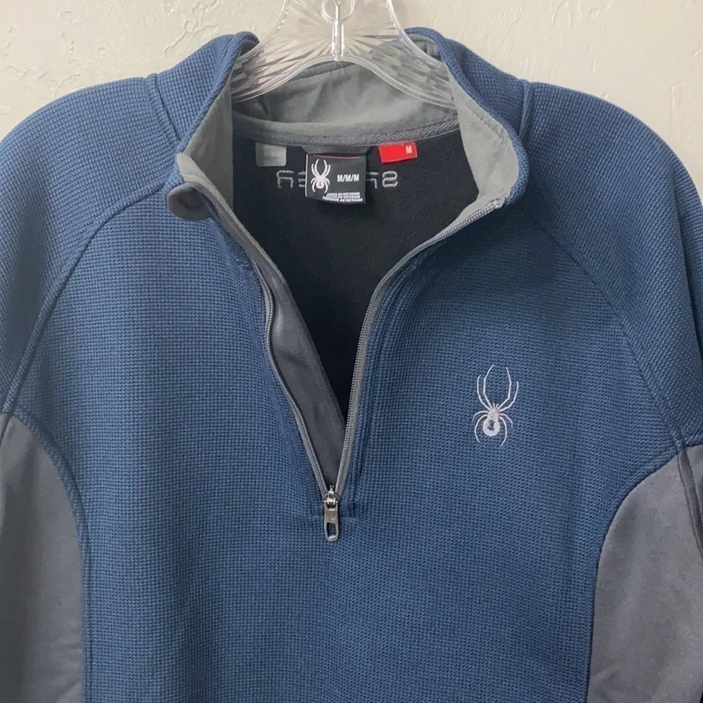 Spyder 1/4 zip Blue and gray jacket size medium.